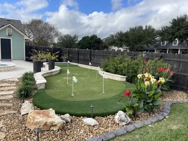 backyard a gan mini golf in backyard next to pool